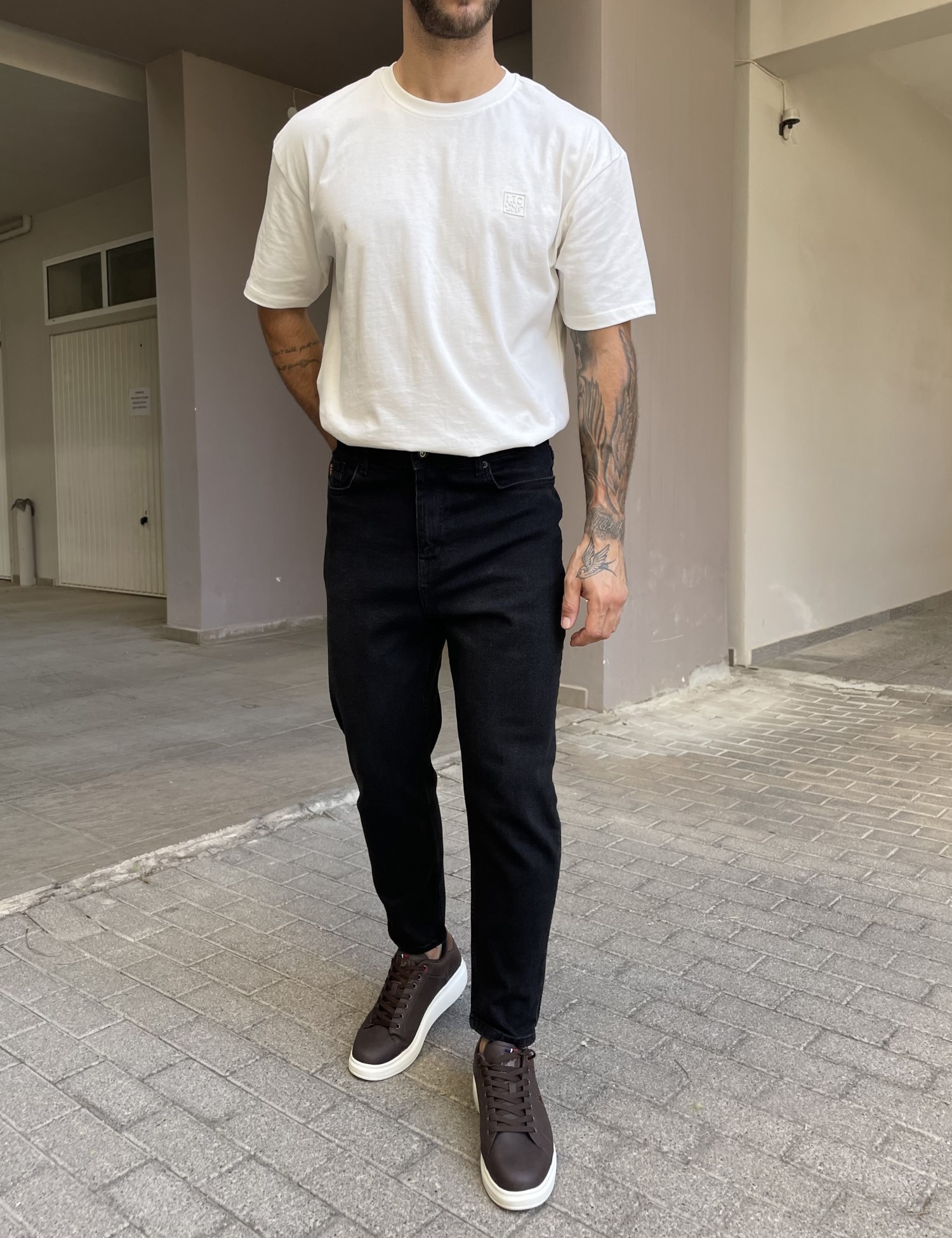 Ανδρικό μαύρο πλυμένο ελαστικό loose τζιν πεντάτσεπο με φερμουάρ G88115 φωτογραφία